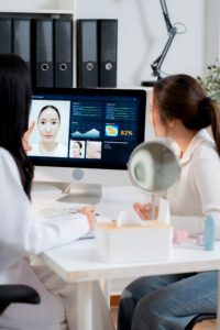 Client discussing lip filler treatment during an aesthetics consultation